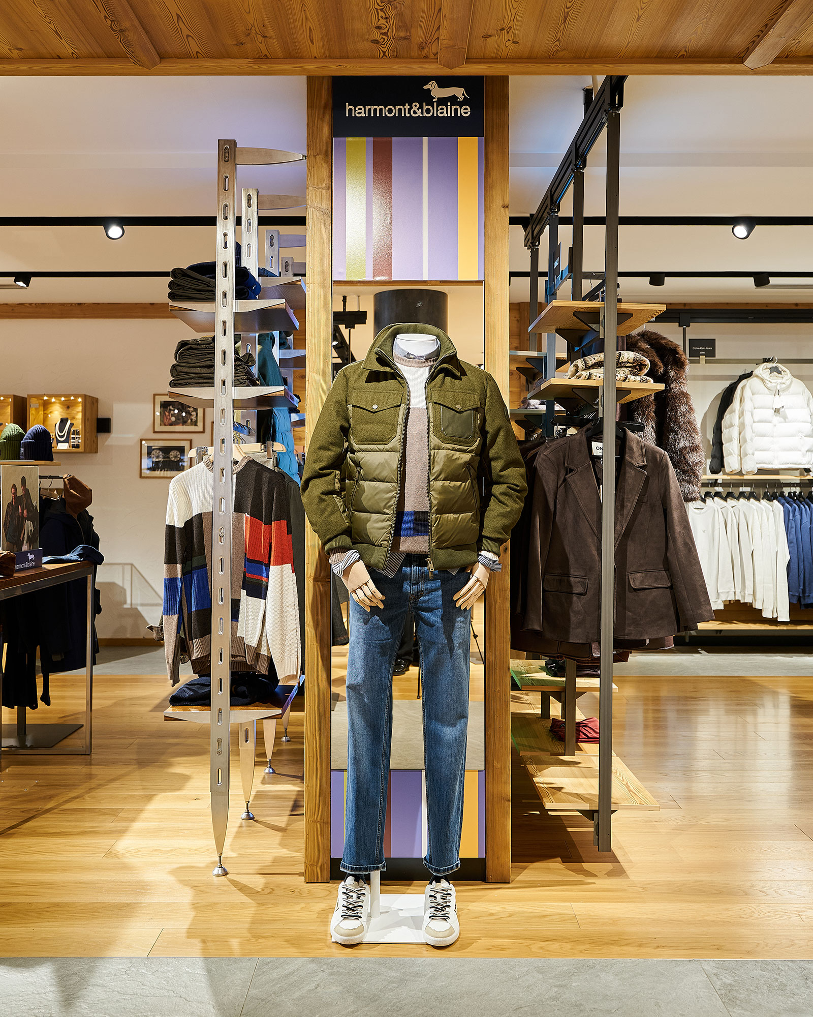 Mannequin wearing Autumn/Winter outfit inside the new corner.