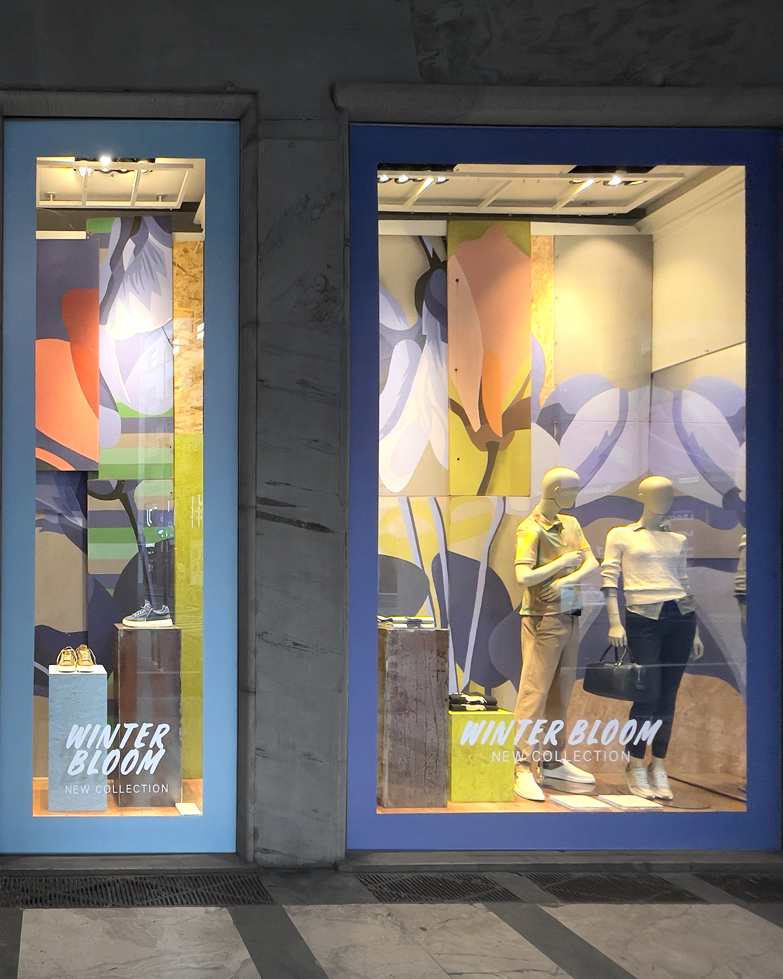 Harmont & Blaine FW25 Schaufenster mit bunten Blumenmotiven und Schaufensterpuppen im Casual-Chic-Look.