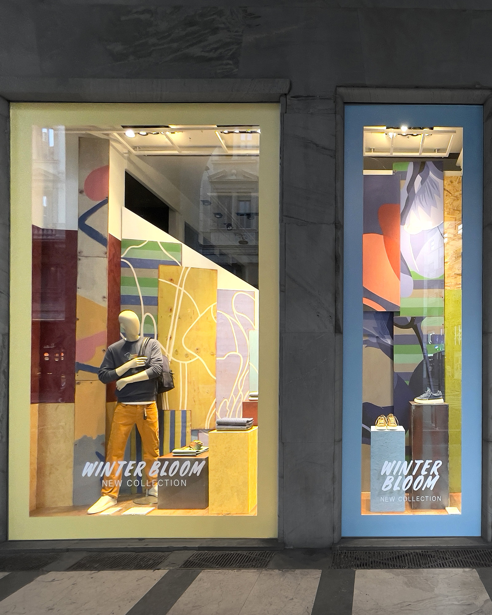 Harmont & Blaine FW25 Schaufenster mit bunten Blumenmotiven und Schaufensterpuppen im Casual-Chic-Look.