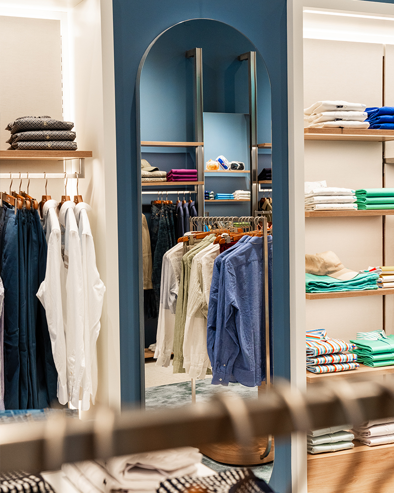 Detail of shelves and mirror in the Harmont & Blaine store.