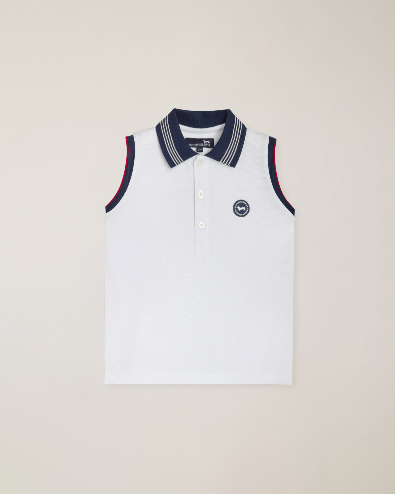 Polo giromanica in piquet con patch lato cuore